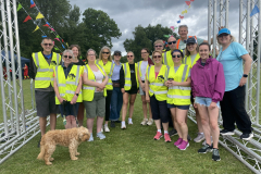 Some of the events team with Laura Muir, Steve Cram and meg the dog