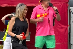 Lisa McNally with the starting horn and the compere for the day with his water pistol